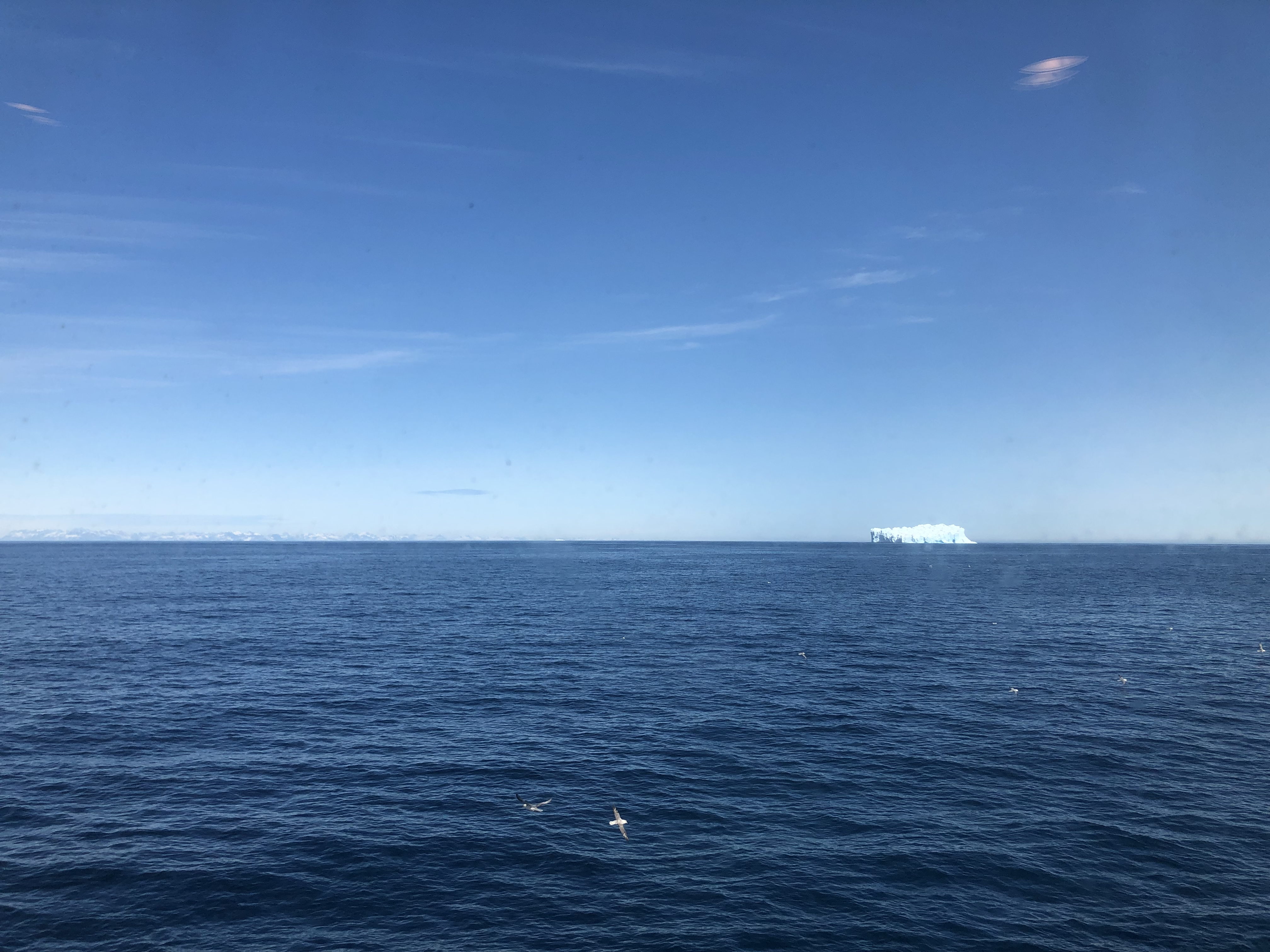 The Flat Waters with a Lone Gigantic Iceberg