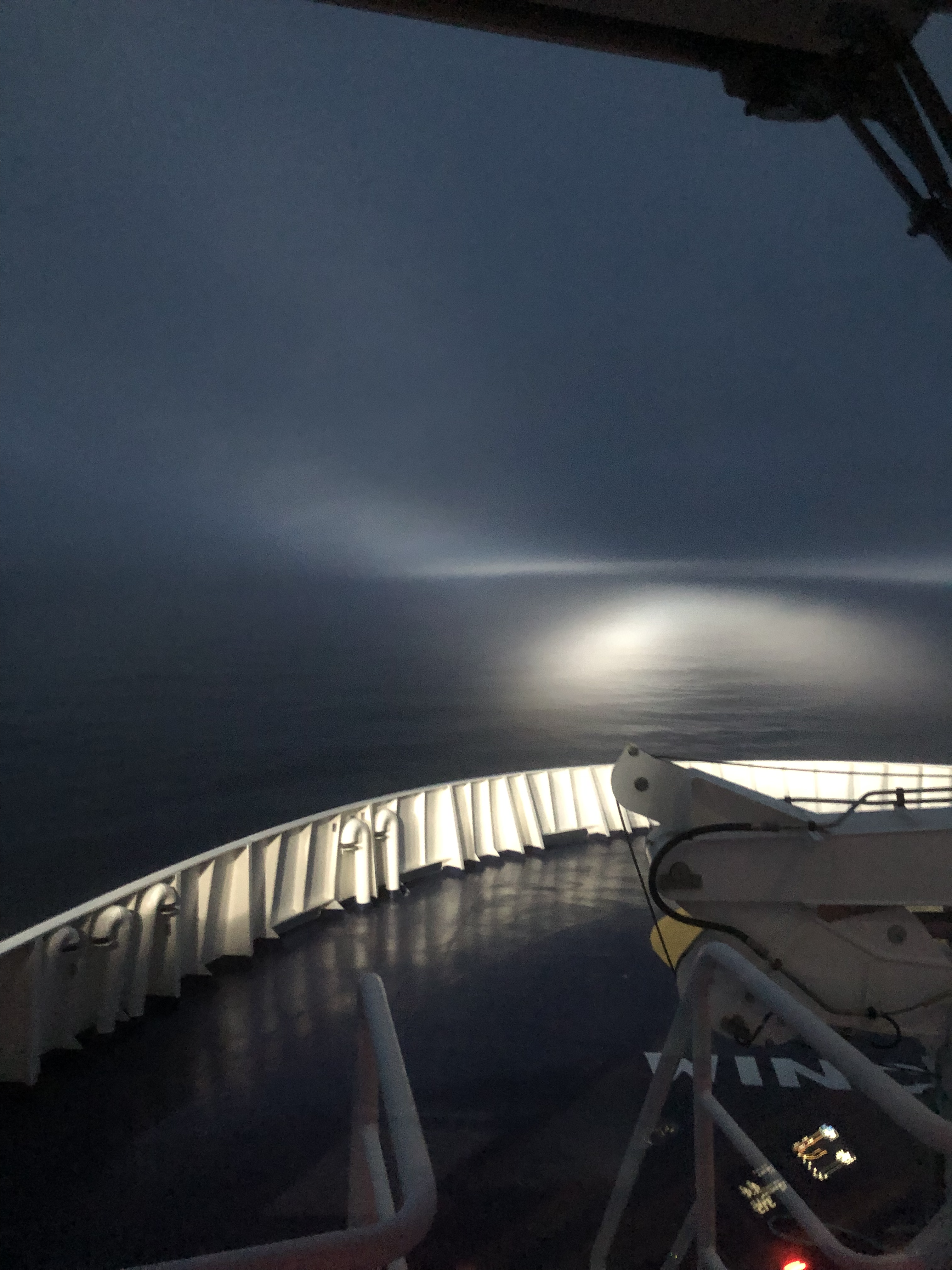 Boat Lights Searching Through the Fog.