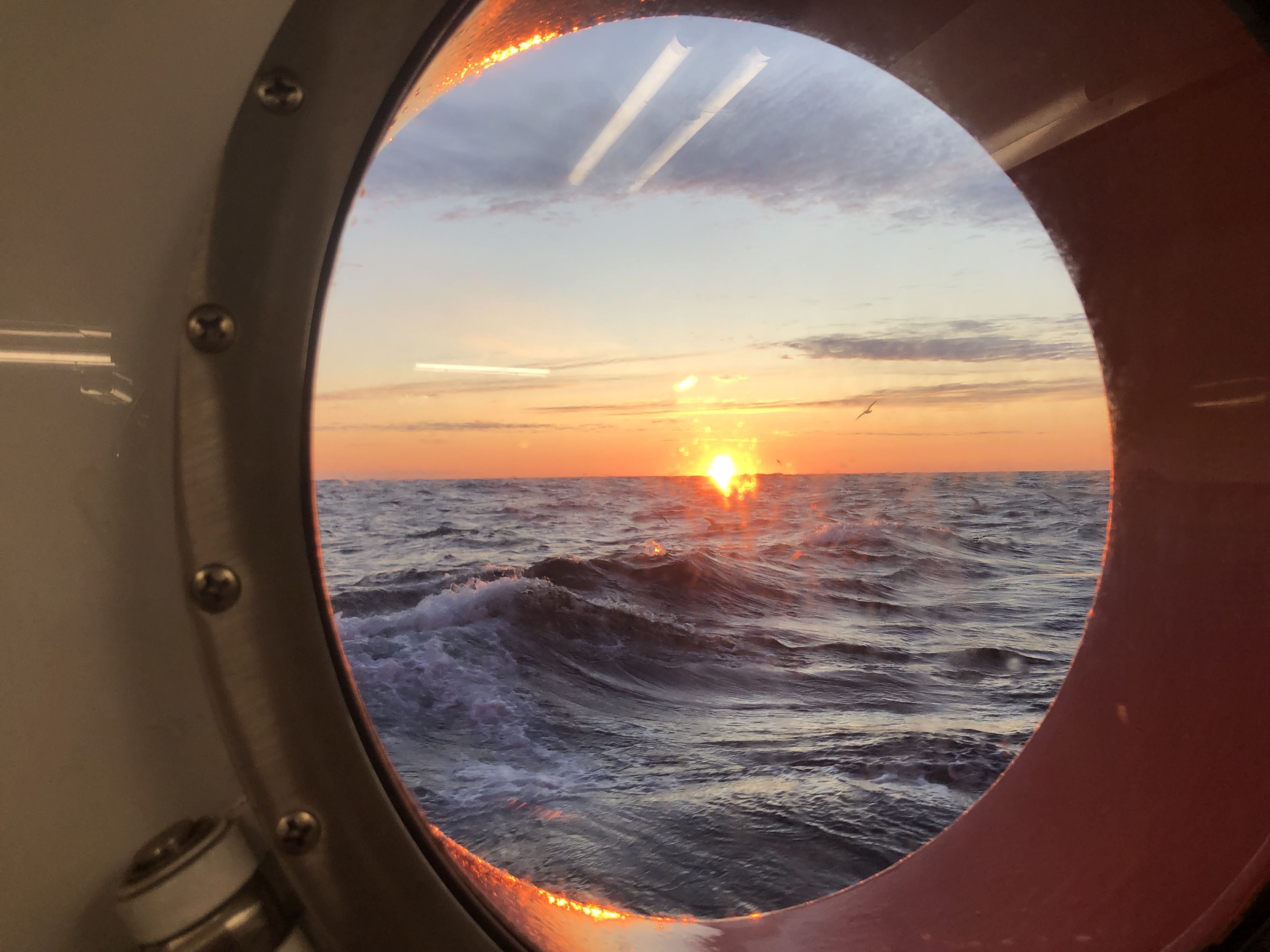 Beginning of Sunset after Stormy Seas.